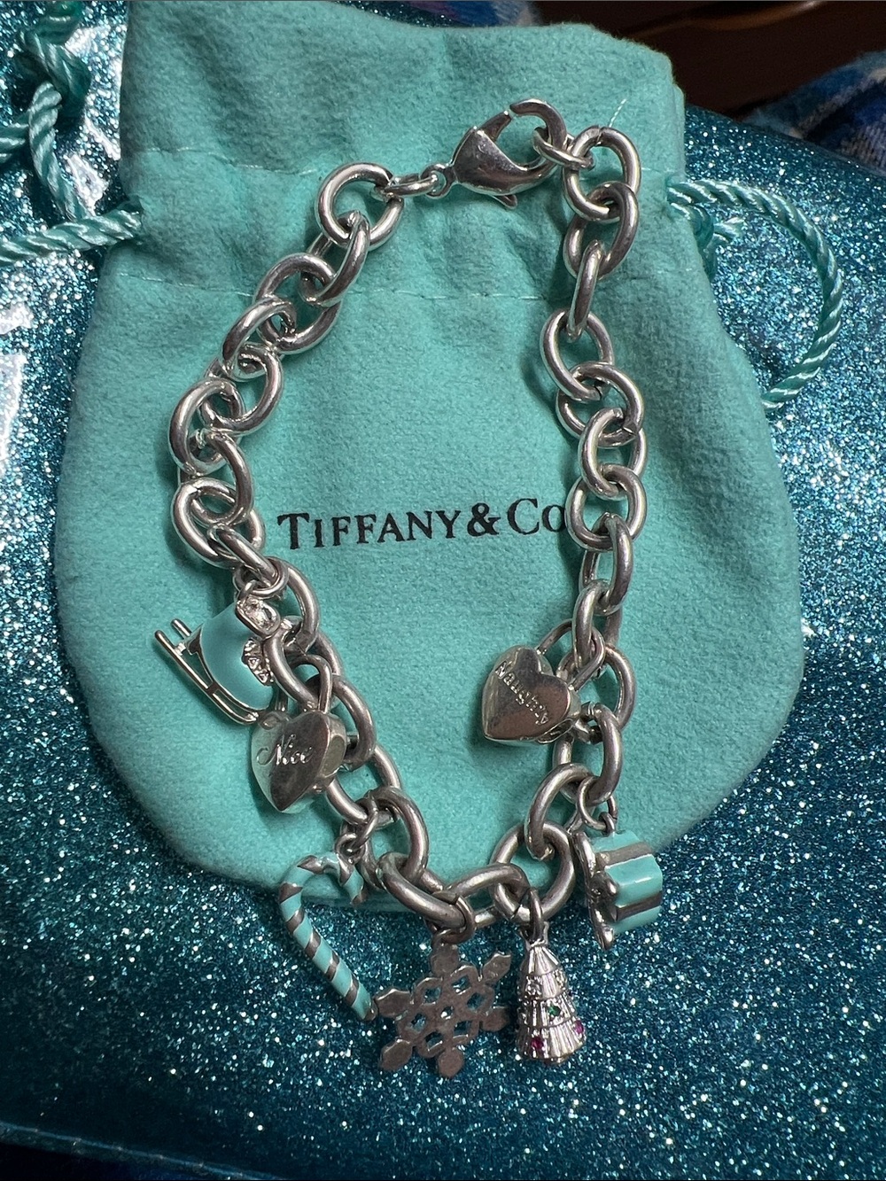 Tiffany & Co. Silver Charm Bracelet with Tiffany Blue Accents